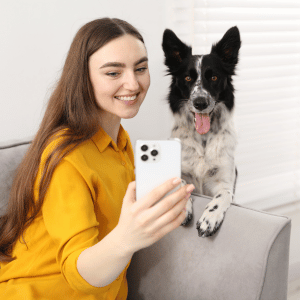 Park Cities Pet Care dog walker with a dog in Dallas, TX